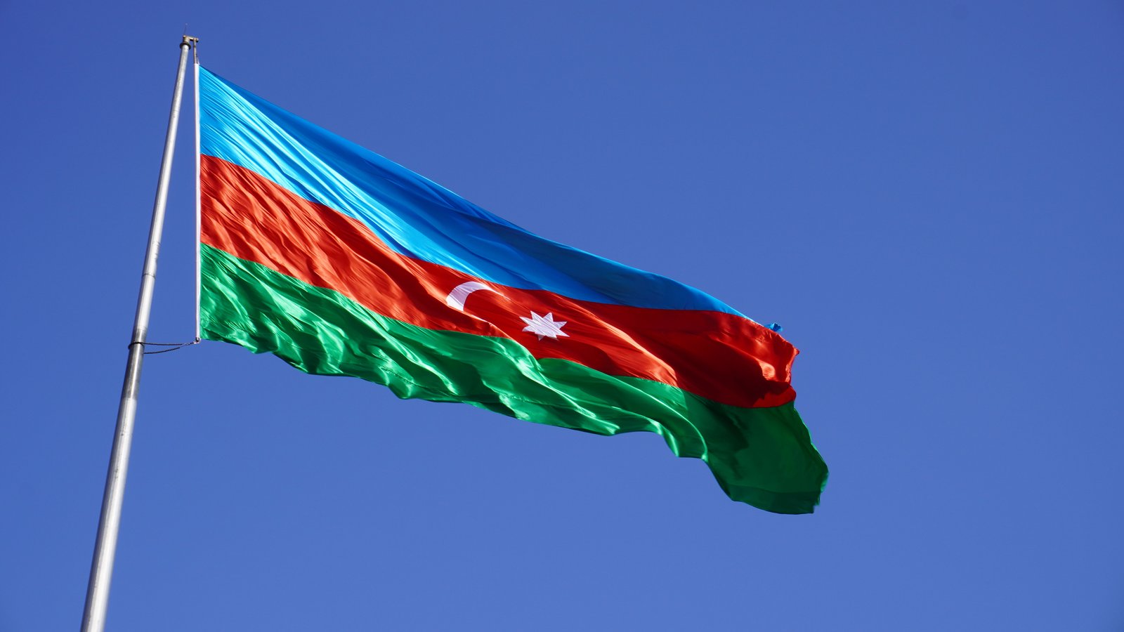 The Flag of Azerbaijan: History, Meaning of the Colours and National Flag Square in Baku